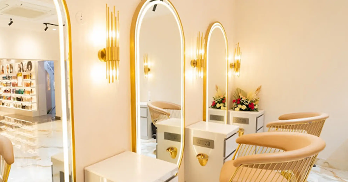 Bright styling stations inside Franck Provost Indiranagar salon in Bengaluru